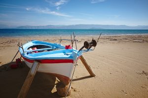 kavos beach korfu 300x200 - Fisherboat Before Tourist Season At Kavos Beach In Corfu, Greece